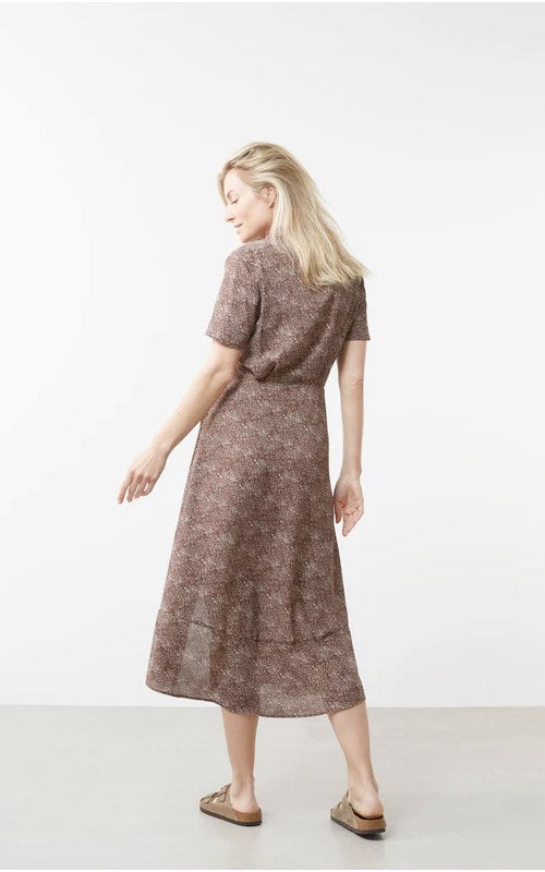 Printed long sleeve dress with knotted waist on model back view
